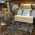 Fördertechnik mit Schnittholzpaket im von TC Maschinenbau realisierten Sortierwerk bei EGGER HOLZ in Liezen.